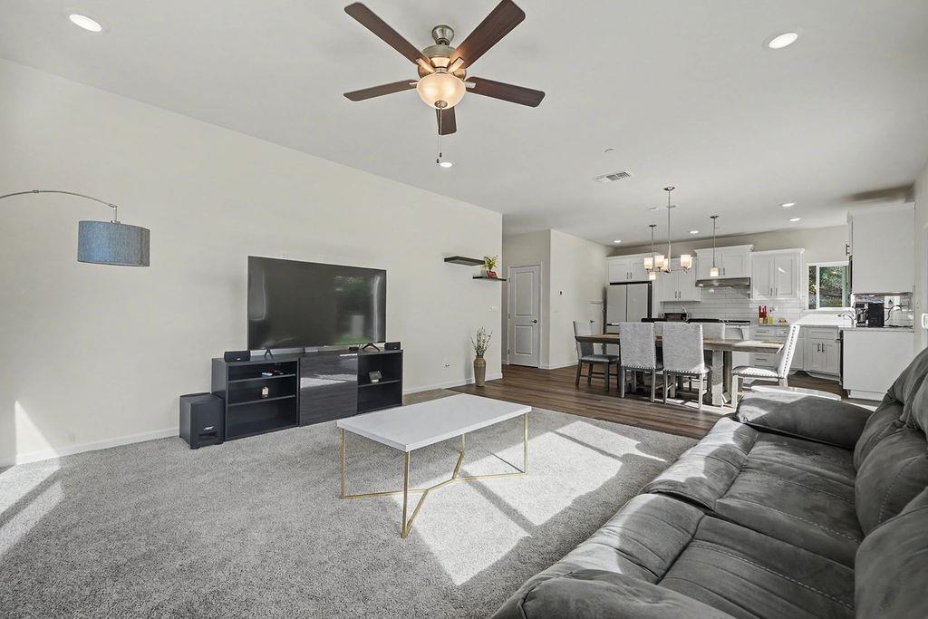 13871 Petersen Ranch Drive Pine Grove, CA 95665 - Photo 9 of 74 a living room with furniture and a flat screen tv