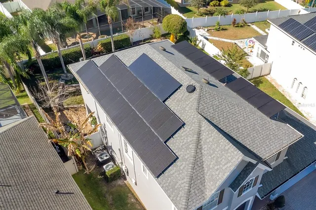 a view of house with yard