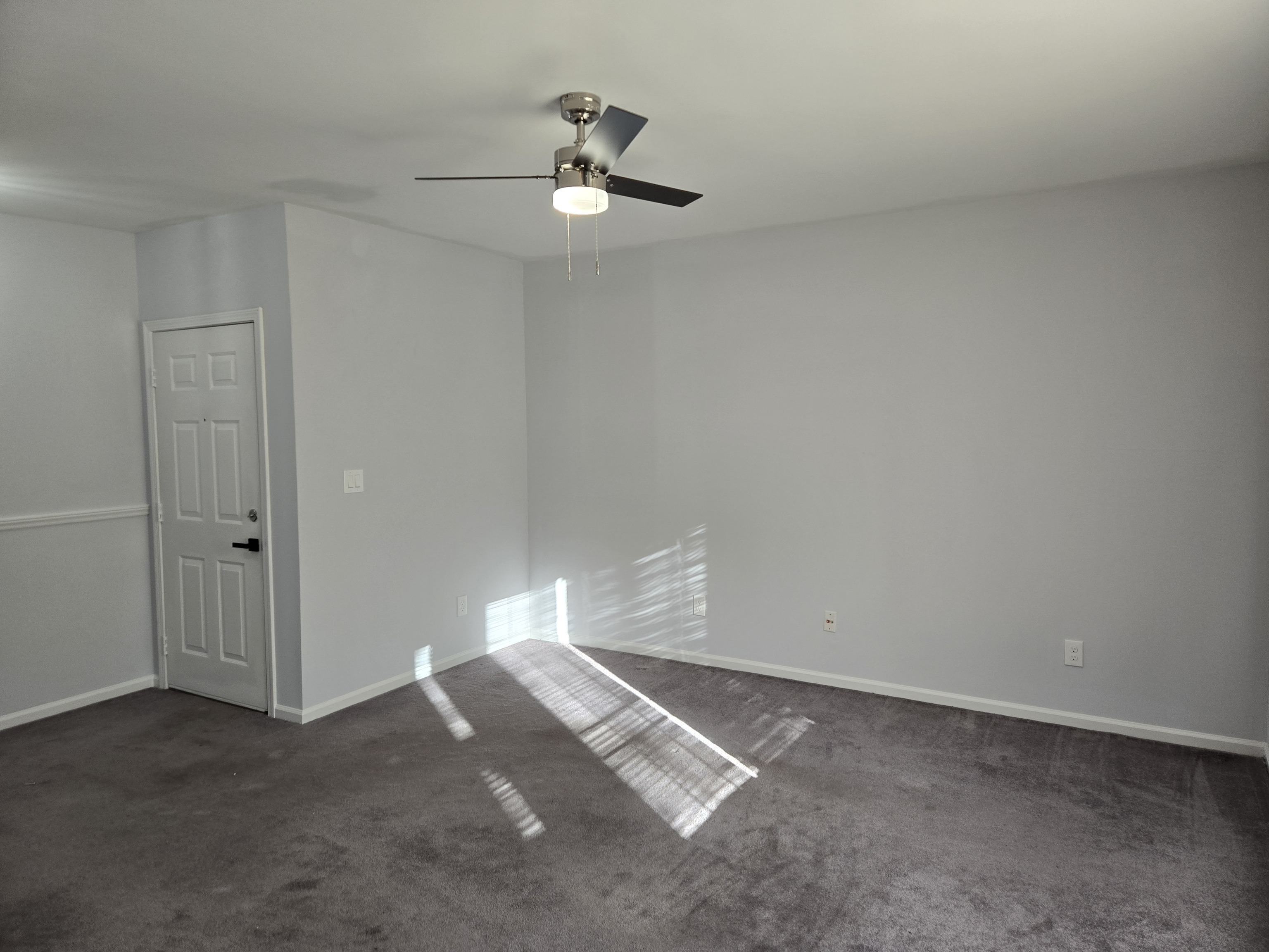 365 Mather Street, Unit 39 Hamden, CT 06514 - Photo 2 of 37 a view of empty room with ceiling fan