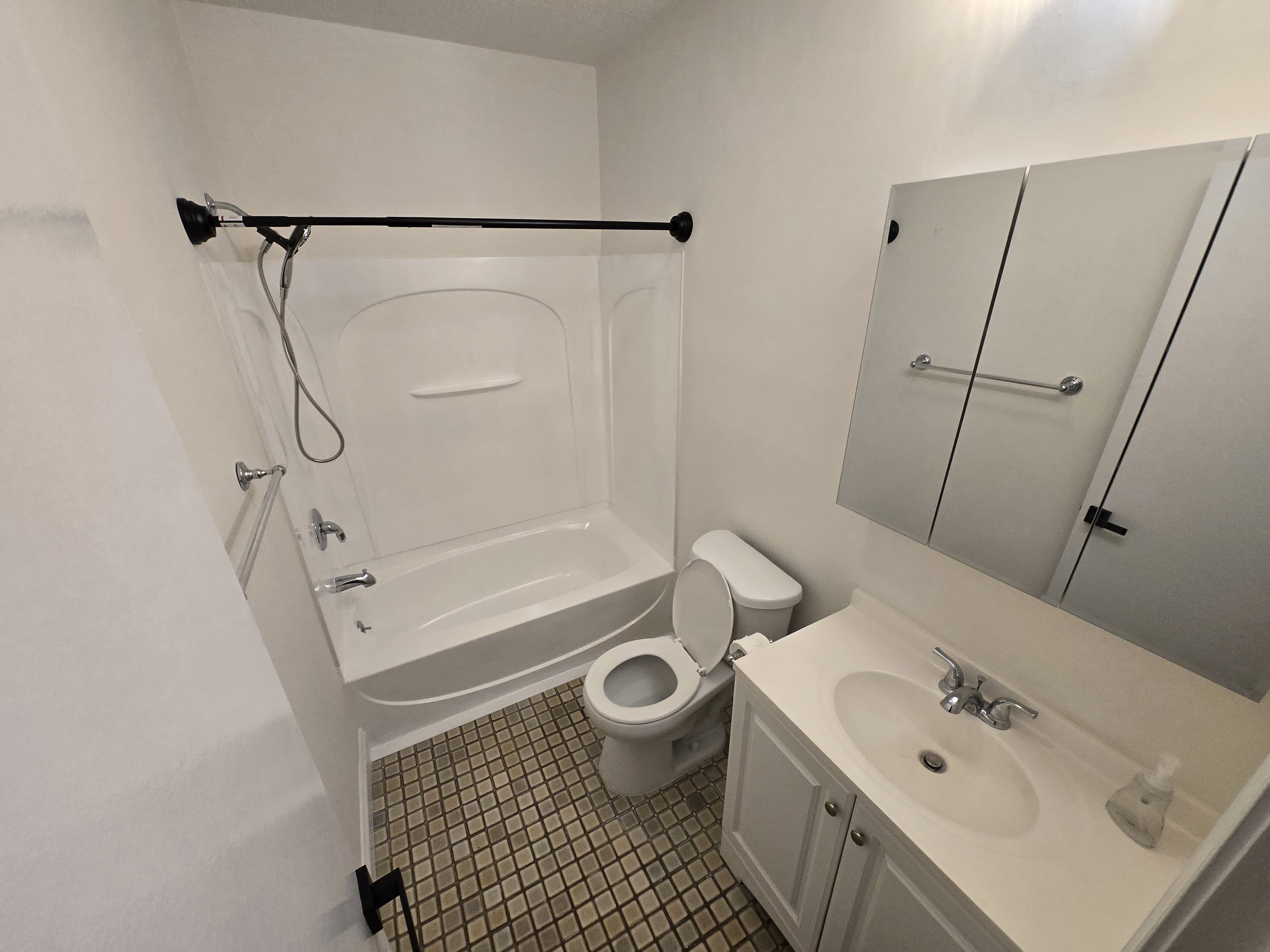 365 Mather Street, Unit 39 Hamden, CT 06514 - Photo 22 of 37 a bathroom with a sink a toilet and shower