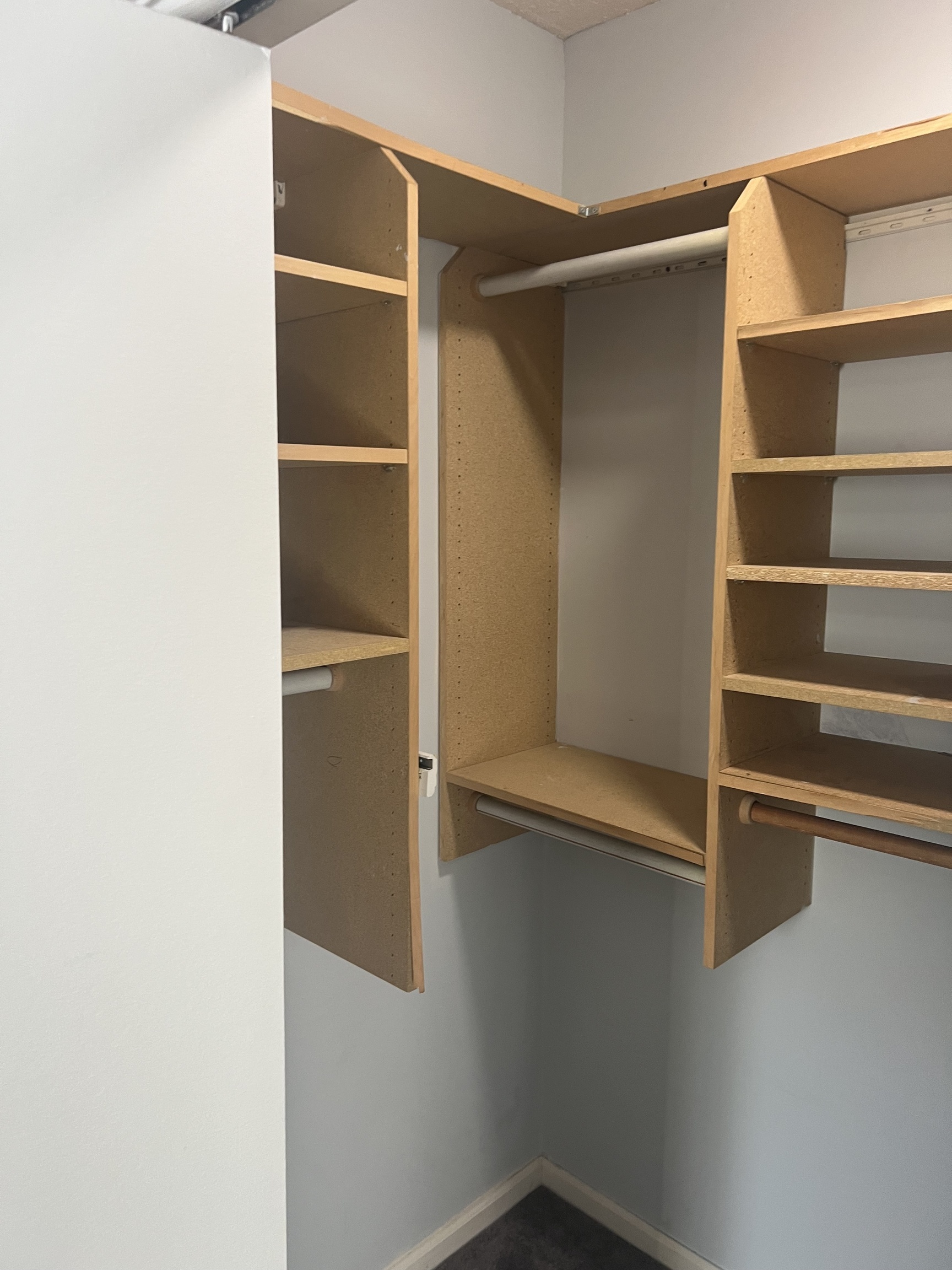 365 Mather Street, Unit 39 Hamden, CT 06514 - Photo 29 of 37 a view of walk in closet with empty racks