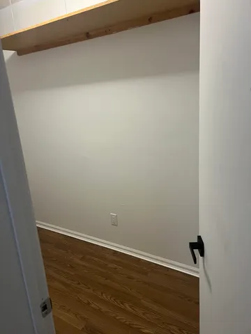 a view of a lake with a house in the background