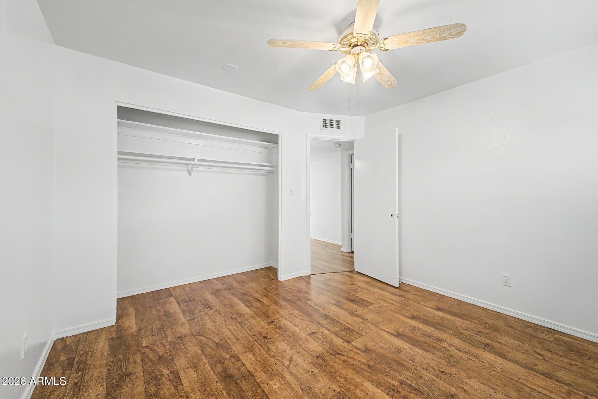 5873 East Thomas Road Scottsdale, AZ 85251 - Photo 16 of 30 a view of empty room with wooden floor