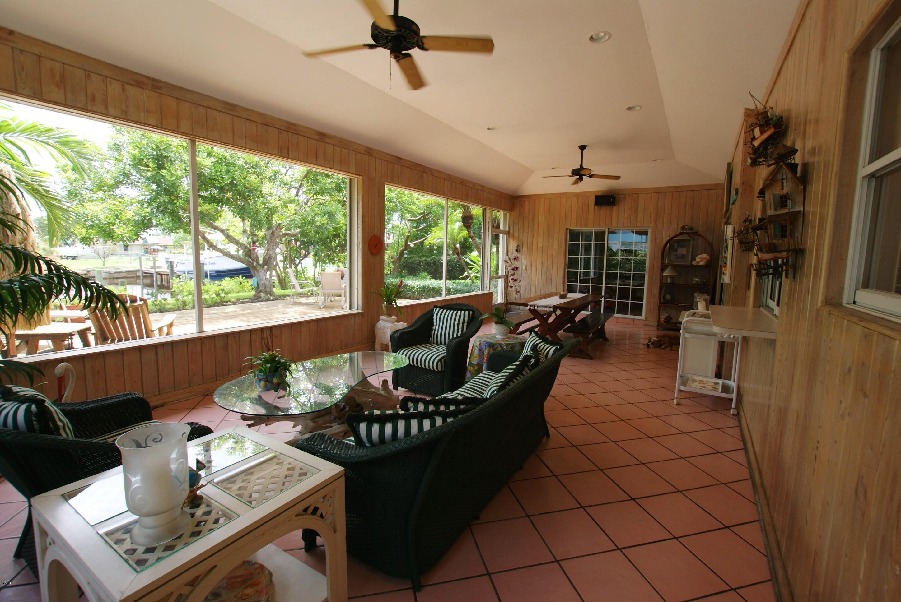 615 Paulina Road Jupiter, FL 33477 - Photo 18 of 23 Enclosed patio 2