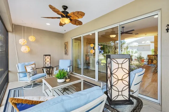 a lobby with furniture and floor to ceiling window