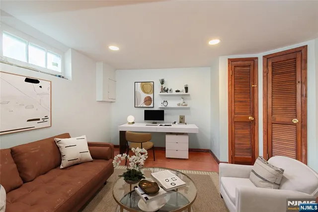 a living room with furniture and a table