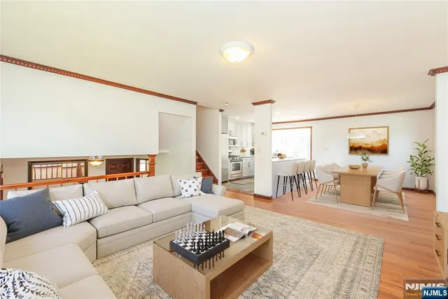 a living room with furniture and a table