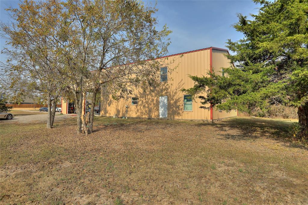 625 Simpson Road Princeton, TX 75407 - Photo 13 of 24 a view of backyard with tree