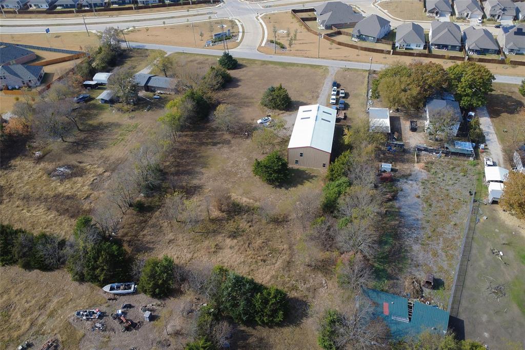 625 Simpson Road Princeton, TX 75407 - Photo 22 of 24 an aerial view of a house with a yard