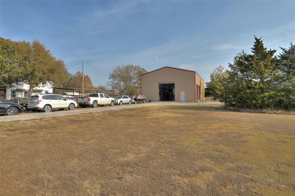 625 Simpson Road Princeton, TX 75407 - Photo 10 of 24 a view of street with parked cars