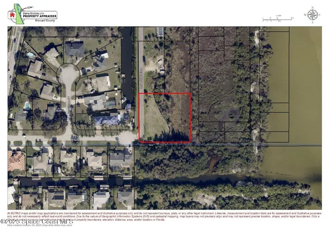 a view of swimming pool with a yard and seating space