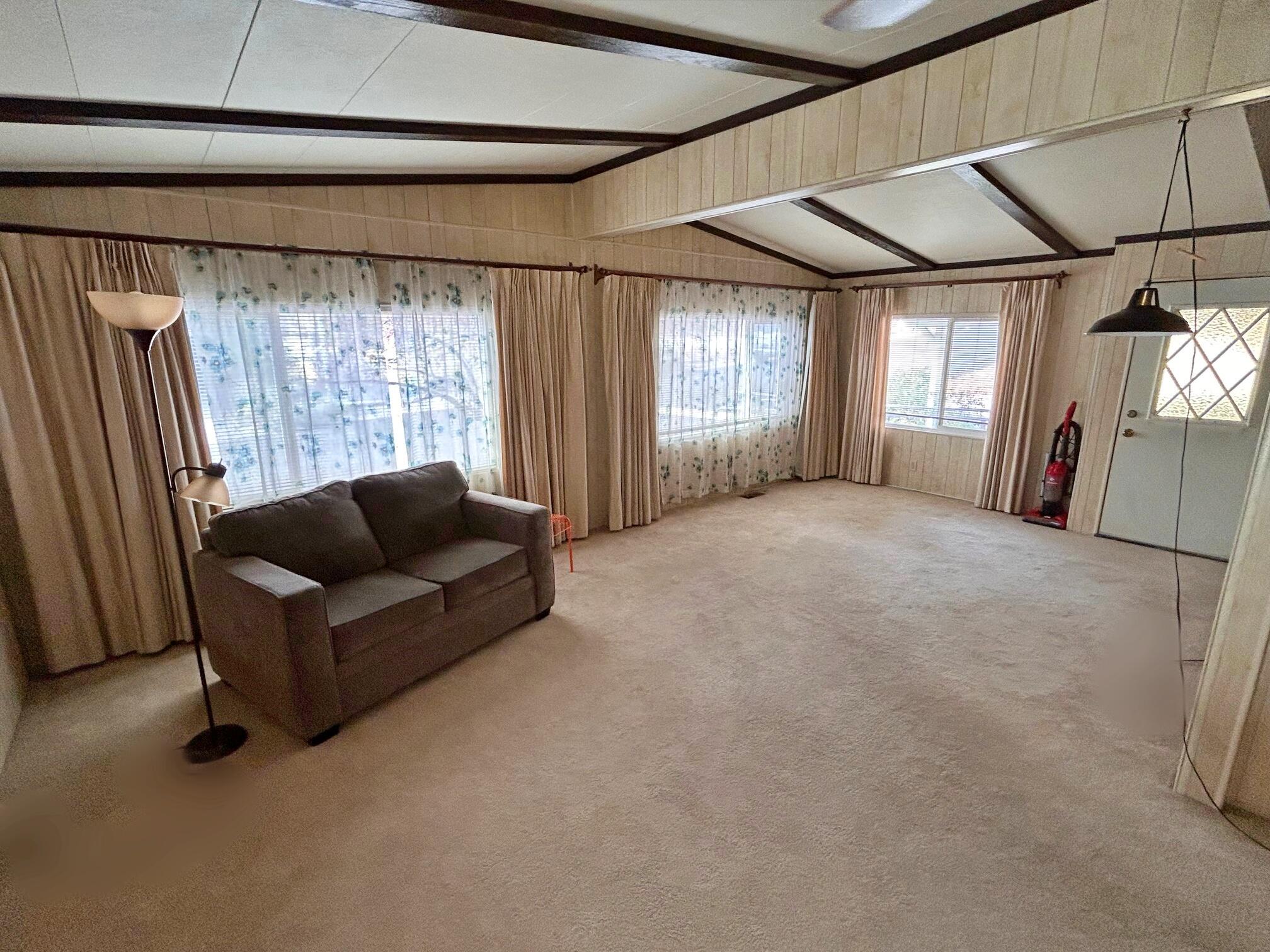 1934 South Old Stage Road, Unit SPC 10 Mount Shasta, CA 96067 - Photo 8 of 12 a living room with furniture and a flat screen tv