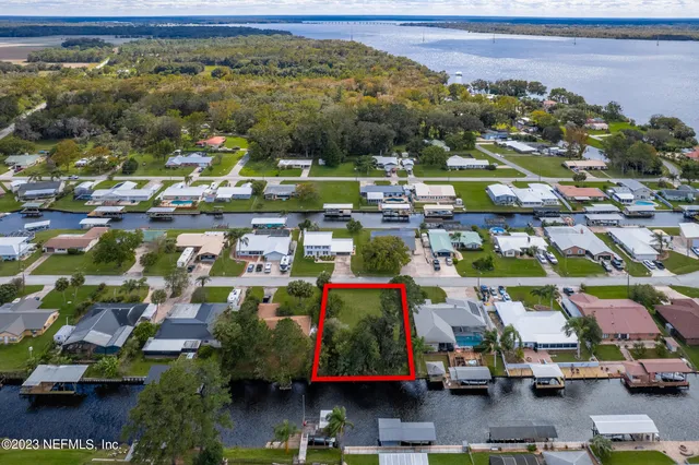 a view of a lake with a houses
