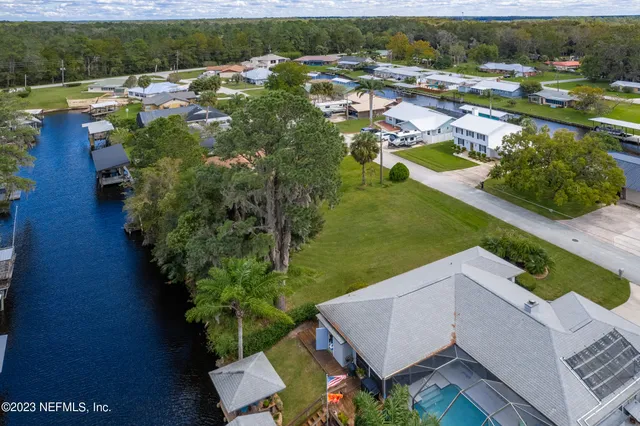 a view of a house with a big yard