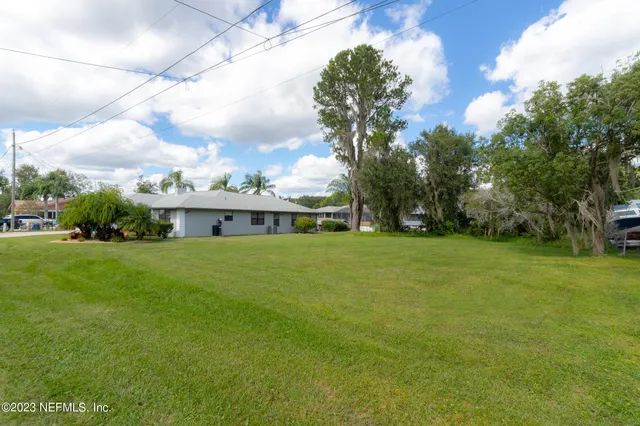 a aerial view of a house with garden