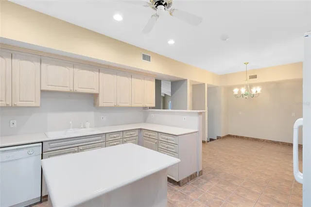 a view of a kitchen with a sink