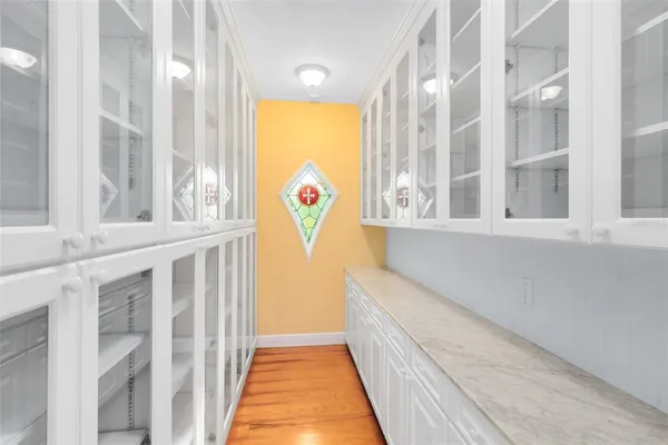 a spacious bedroom with a bed and a couch