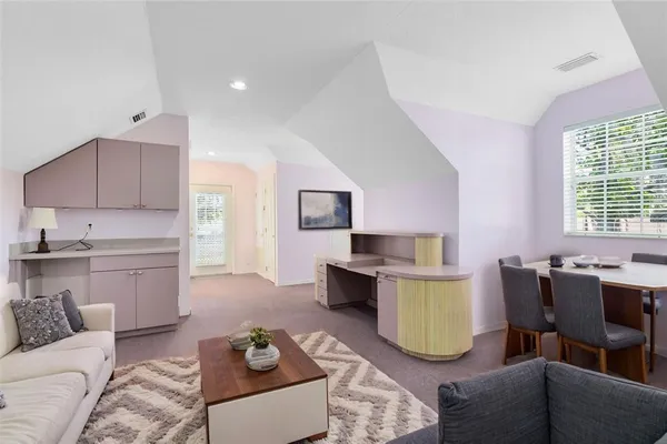 a bedroom with a bed and a cabinets