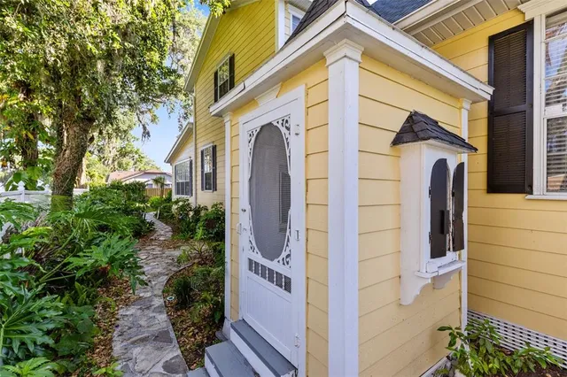 a view of swimming pool with furniture
