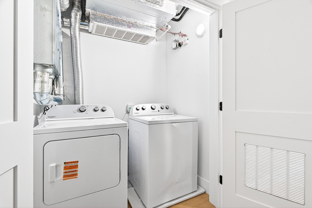 584 Cambridge Street, Unit 1 Boston, MA 02134 - Photo 12 of 17 a utility room with dryer and washer