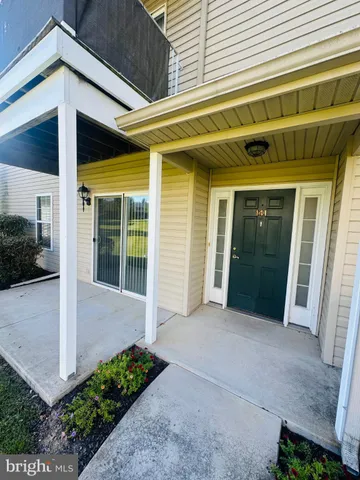 a front view of a house with a porch