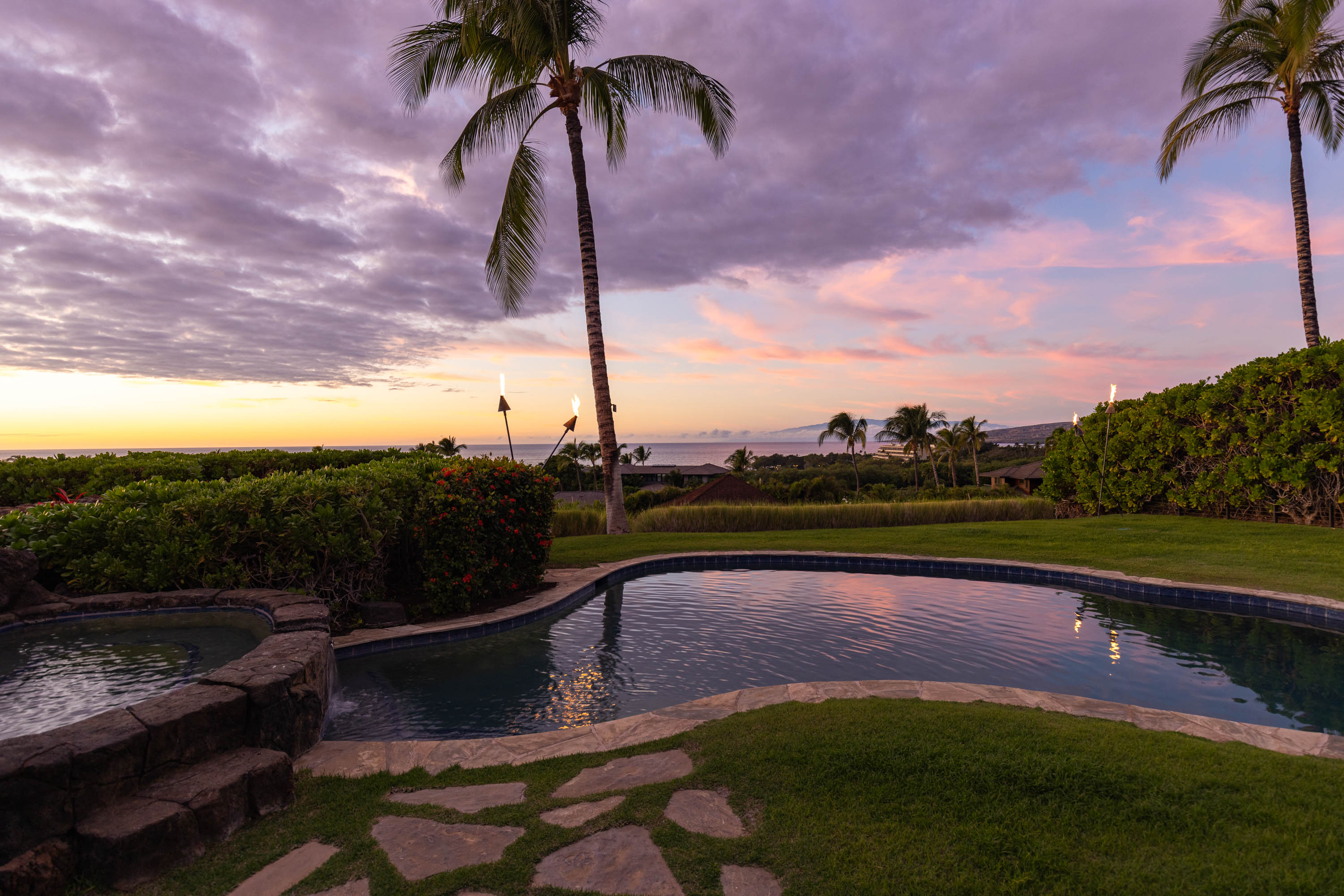 62-3979 Kaunaoa Iki Road, Unit 2A Kamuela, HI 96743 - Photo 15 of 17 a view of a backyard with a lake view