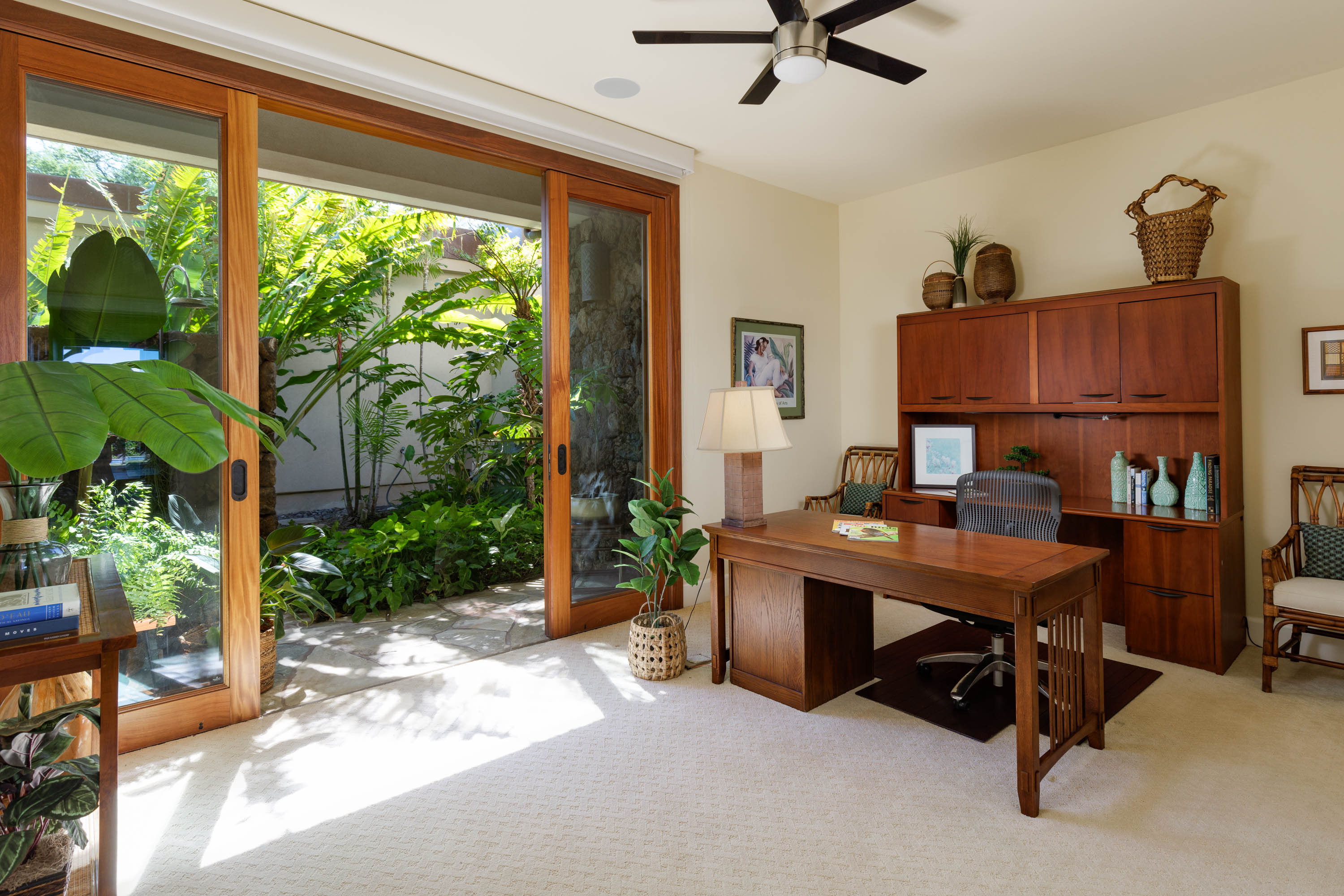 62-3979 Kaunaoa Iki Road, Unit 2A Kamuela, HI 96743 - Photo 8 of 17 a view of a workspace with furniture and a window