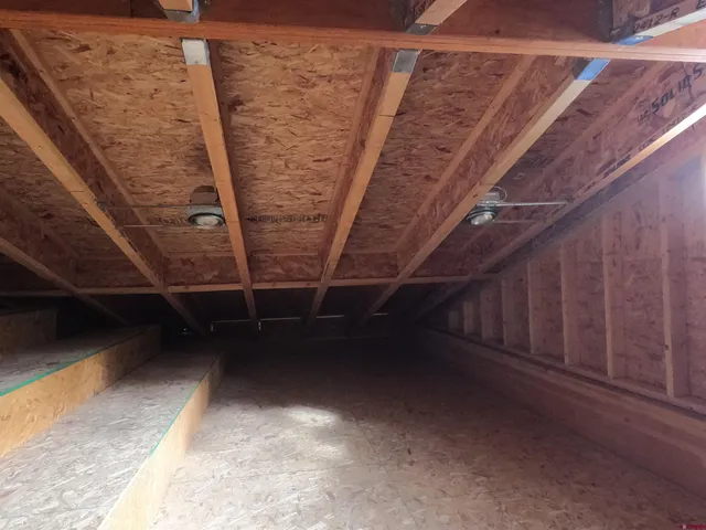 a view of game room with windows