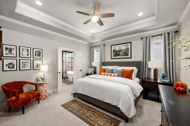 a bed room with a bed and a couch