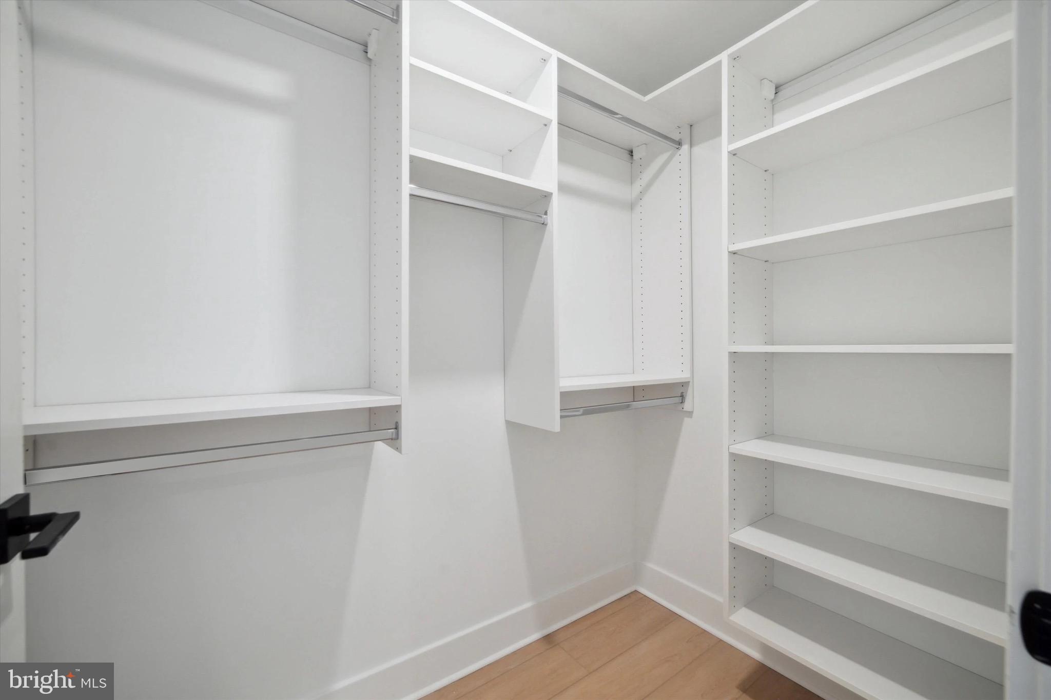 1643 North 2nd Street, Unit 302 Philadelphia, PA 19122 - Photo 16 of 40 a view of walk in closet with empty racks