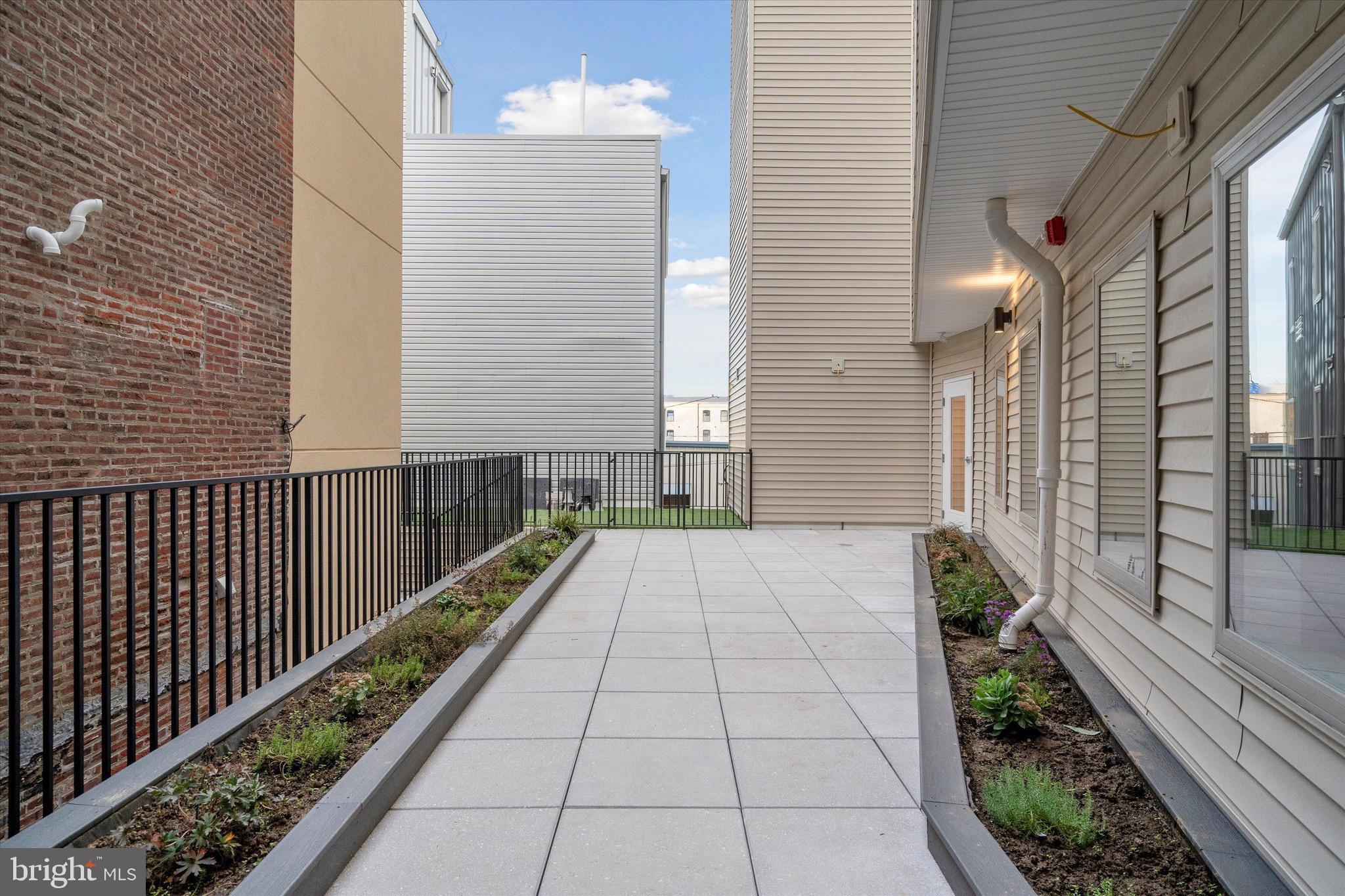 1643 North 2nd Street, Unit 302 Philadelphia, PA 19122 - Photo 26 of 40 a view of a pathway both side of house