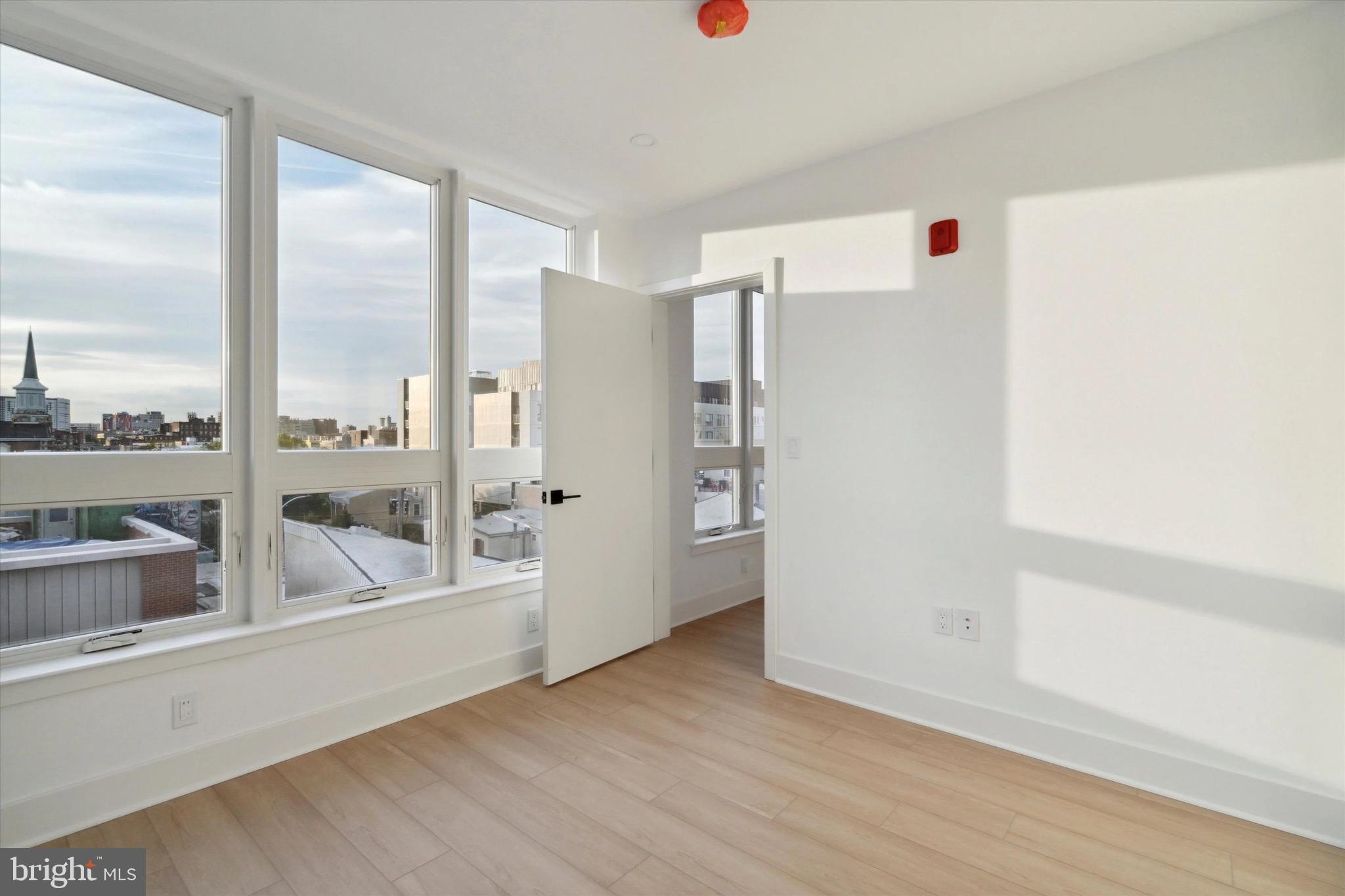 1643 North 2nd Street, Unit 302 Philadelphia, PA 19122 - Photo 32 of 40 a view of an empty room with a window