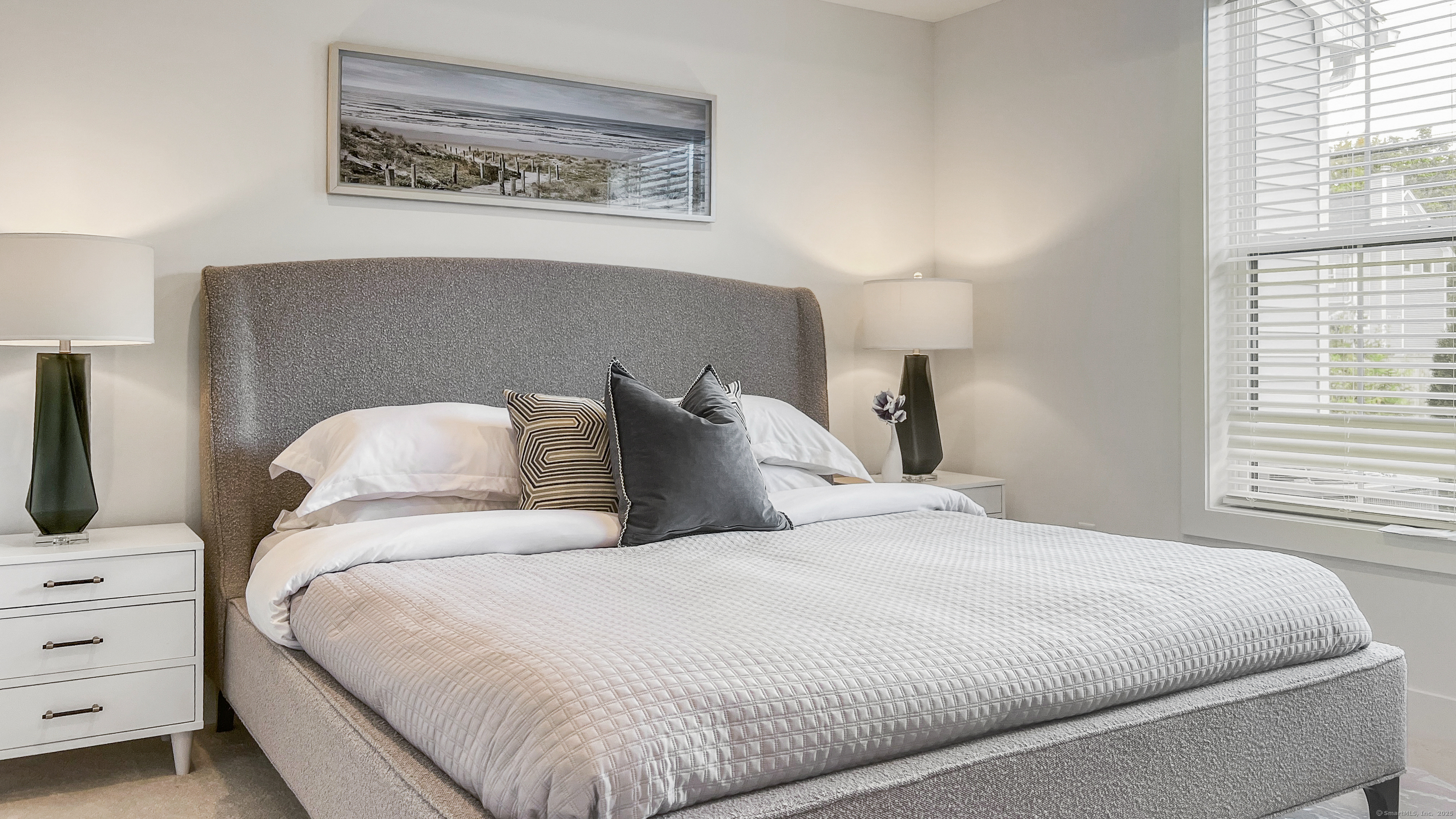 6 Whisper Rdg Way, Unit 42 Woodbridge, CT 06525 - Photo 8 of 17 a bedroom with a bed and a night stand