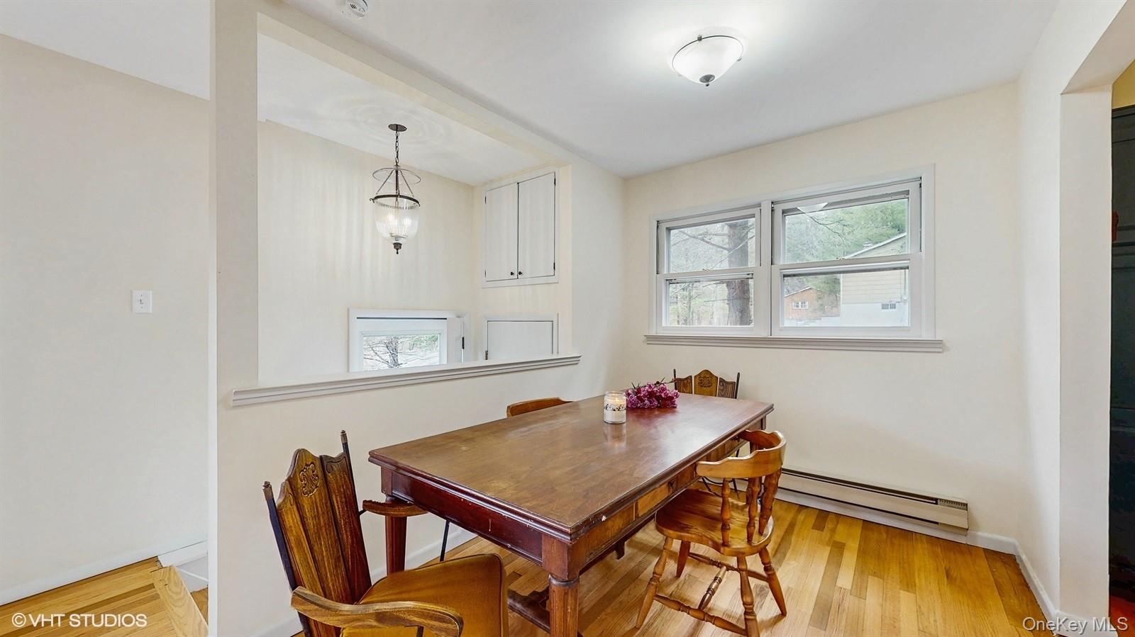 736 State Rte 55 Napanoch, NY 12458 - Photo 8 of 49 Dining space with light wood-style floors