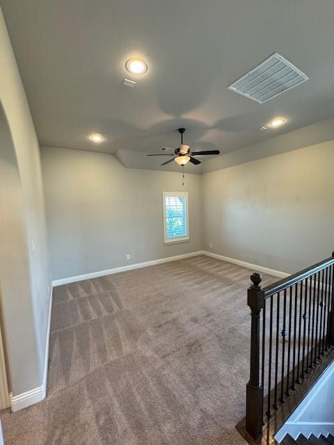 796 Huntingdon Street Coppell, TX 75019 - Photo 18 of 32 an empty room with a ceiling fan and windows