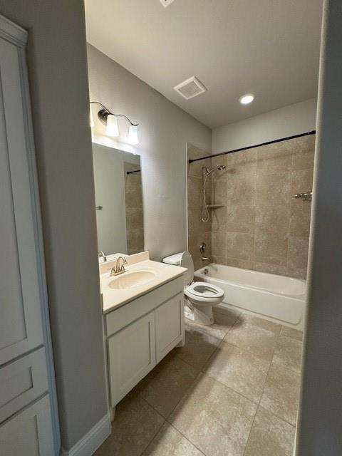 796 Huntingdon Street Coppell, TX 75019 - Photo 21 of 32 a bathroom with a sink a toilet and shower
