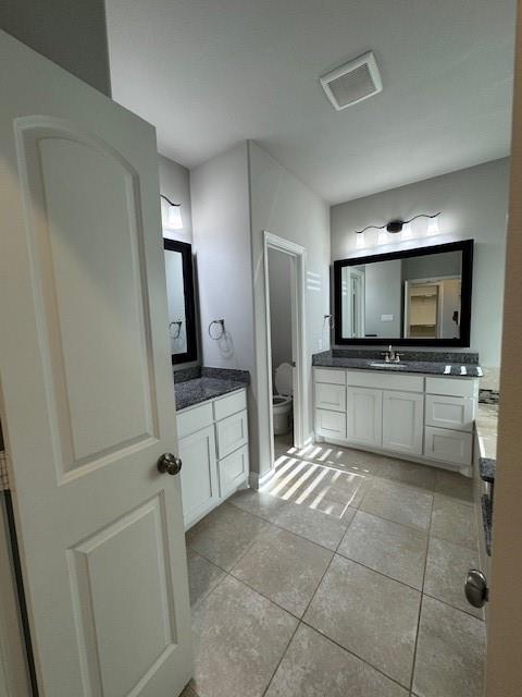 796 Huntingdon Street Coppell, TX 75019 - Photo 26 of 32 a kitchen with a sink and stainless steel appliances