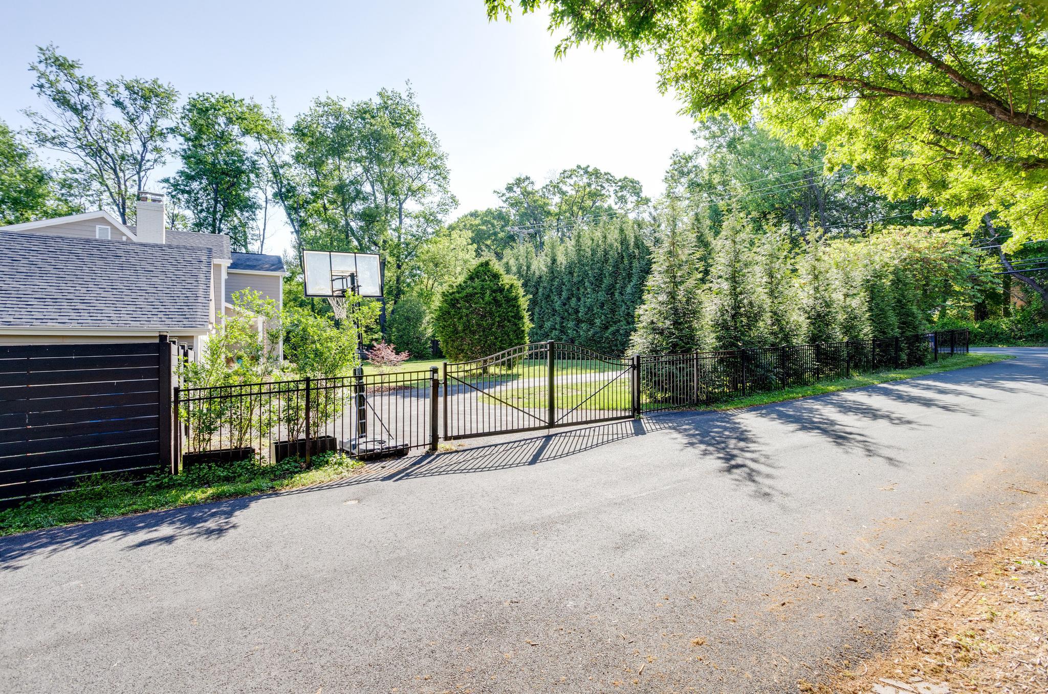 11306 Vale Road Oakton, VA 22124 - Photo 56 of 74 Side gated entry/exit from pipestem