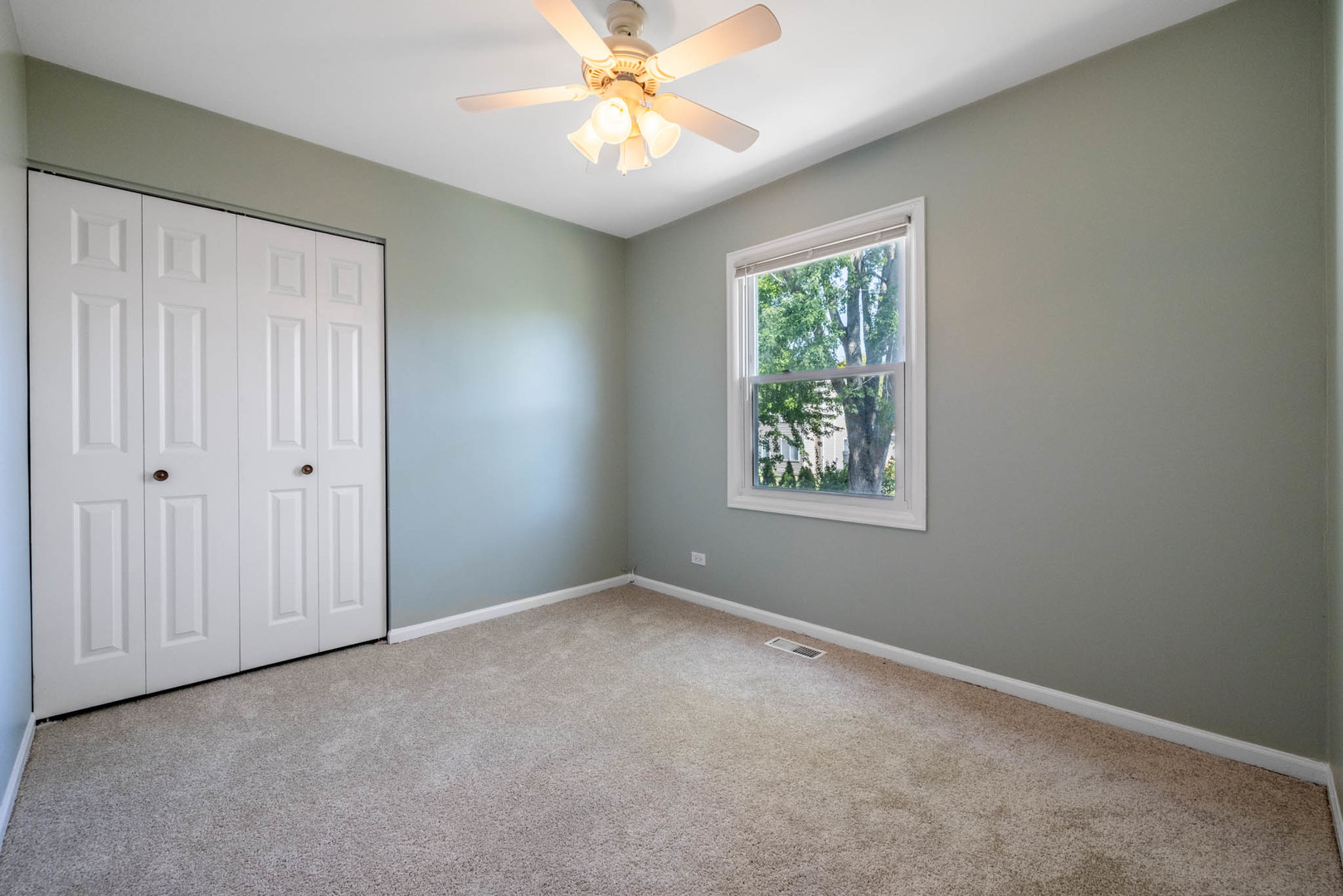 983 Stuart Drive Bartlett, IL 60103 - Photo 15 of 25 a view of an empty room with a window