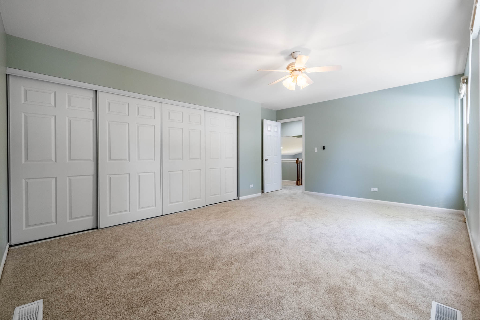 983 Stuart Drive Bartlett, IL 60103 - Photo 18 of 25 a view of an empty room with a window