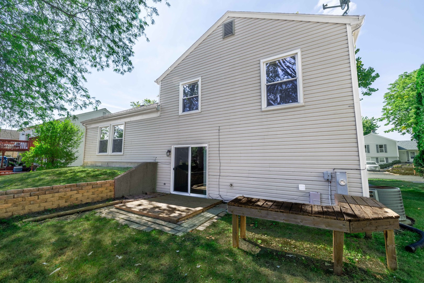 983 Stuart Drive Bartlett, IL 60103 - Photo 24 of 25 a front view of a house with a yard