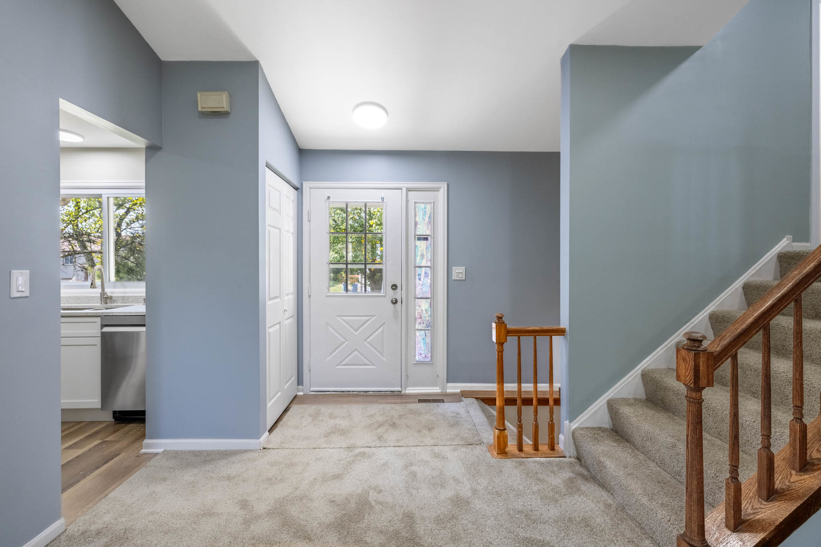 983 Stuart Drive Bartlett, IL 60103 - Photo 3 of 25 a view of an entryway with staircase