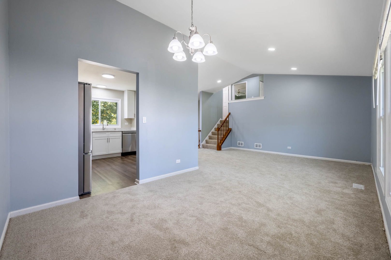 983 Stuart Drive Bartlett, IL 60103 - Photo 6 of 25 a view of a livingroom with a chandelier