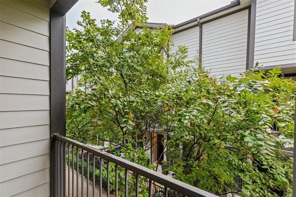 5924 Hudson Street, Unit F Dallas, TX 75206 - Photo 23 of 25 a view of a house with a plant