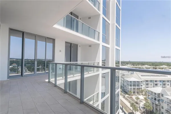 a view of a balcony with an ocean view