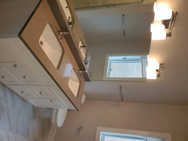 a view of a hallway with entryway