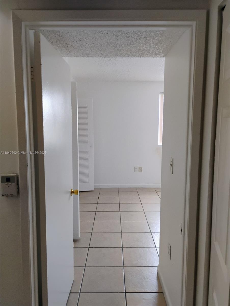 6045 Northwest 186th Street, Unit 304 Hialeah, FL 33015 - Photo 11 of 28
