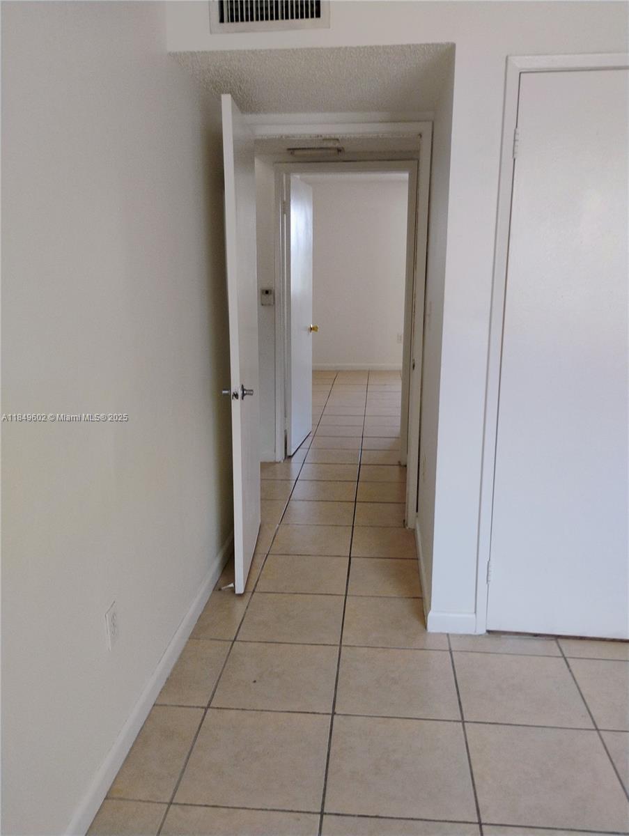 6045 Northwest 186th Street, Unit 304 Hialeah, FL 33015 - Photo 20 of 28