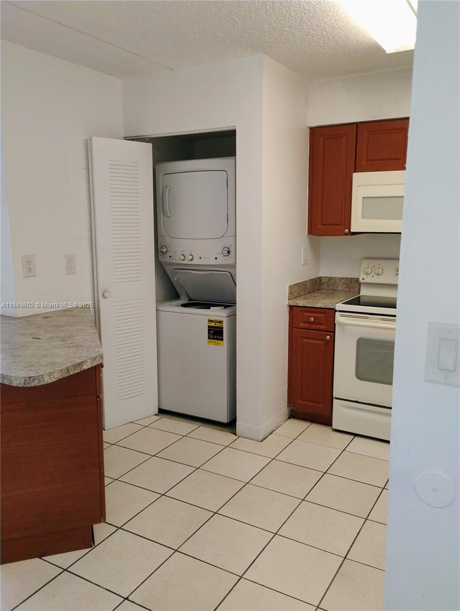 6045 Northwest 186th Street, Unit 304 Hialeah, FL 33015 - Photo 2 of 28