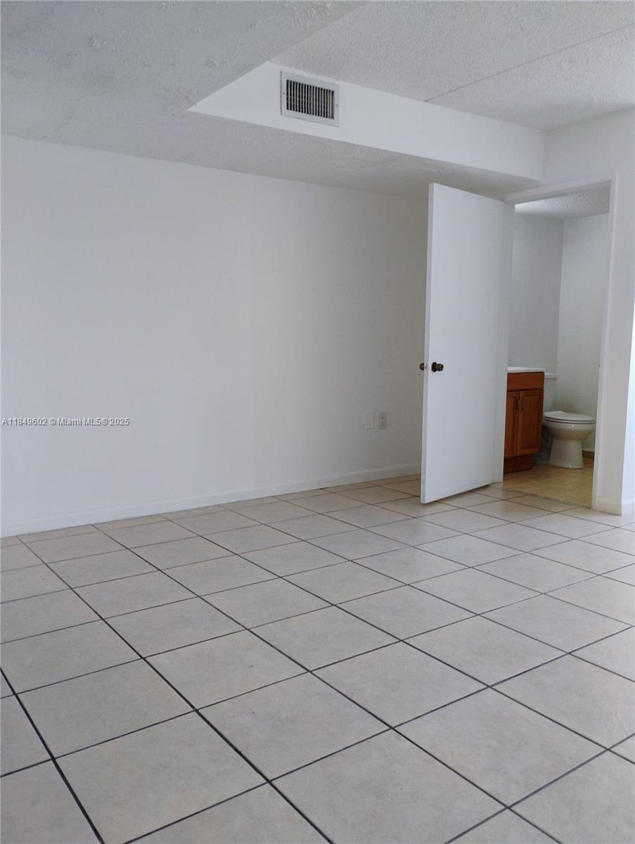 6045 Northwest 186th Street, Unit 304 Hialeah, FL 33015 - Photo 6 of 28